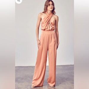 Do + Be rose gold cross front, wide leg satin jumpsuit size medium